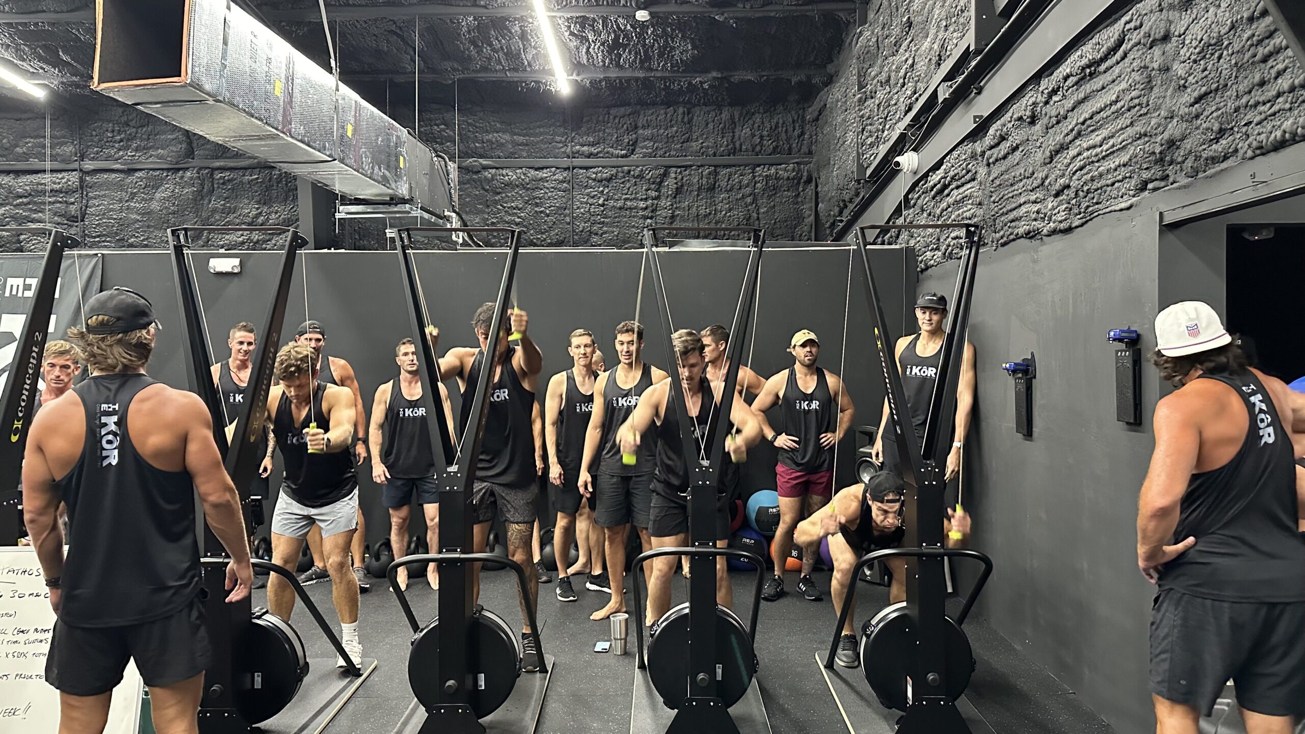 KoR Fitness training session - people working out in modern gym with cold plunge and sauna facilities